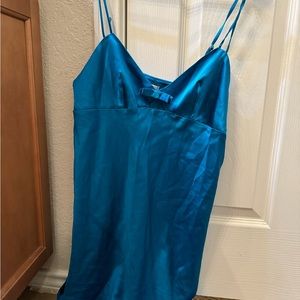 Blue Victoria’s Secret slip with keyhole cutout and front bow, size M